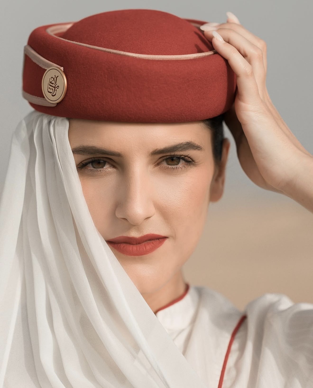 Vanessa as Emirates flight attendant